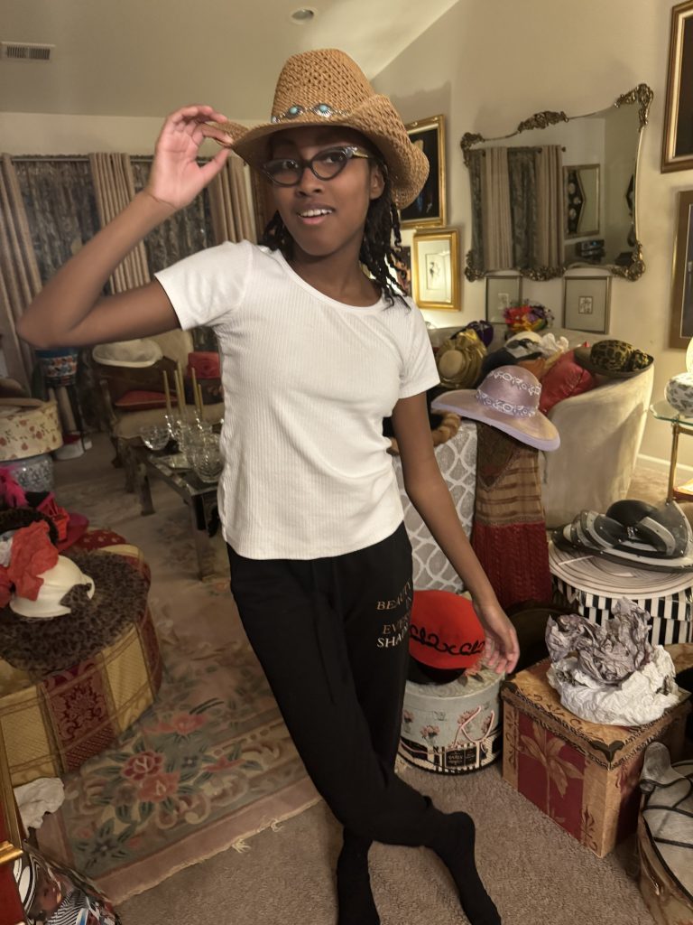Nadiyah posing with cowboy hat